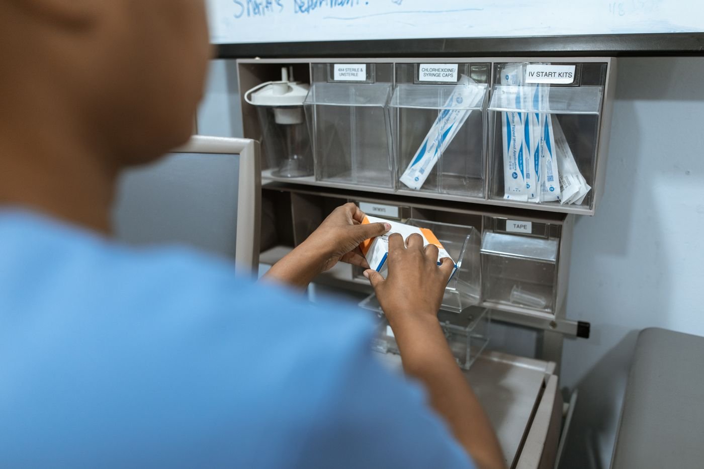 Organized medical supply bins ready for courier transport