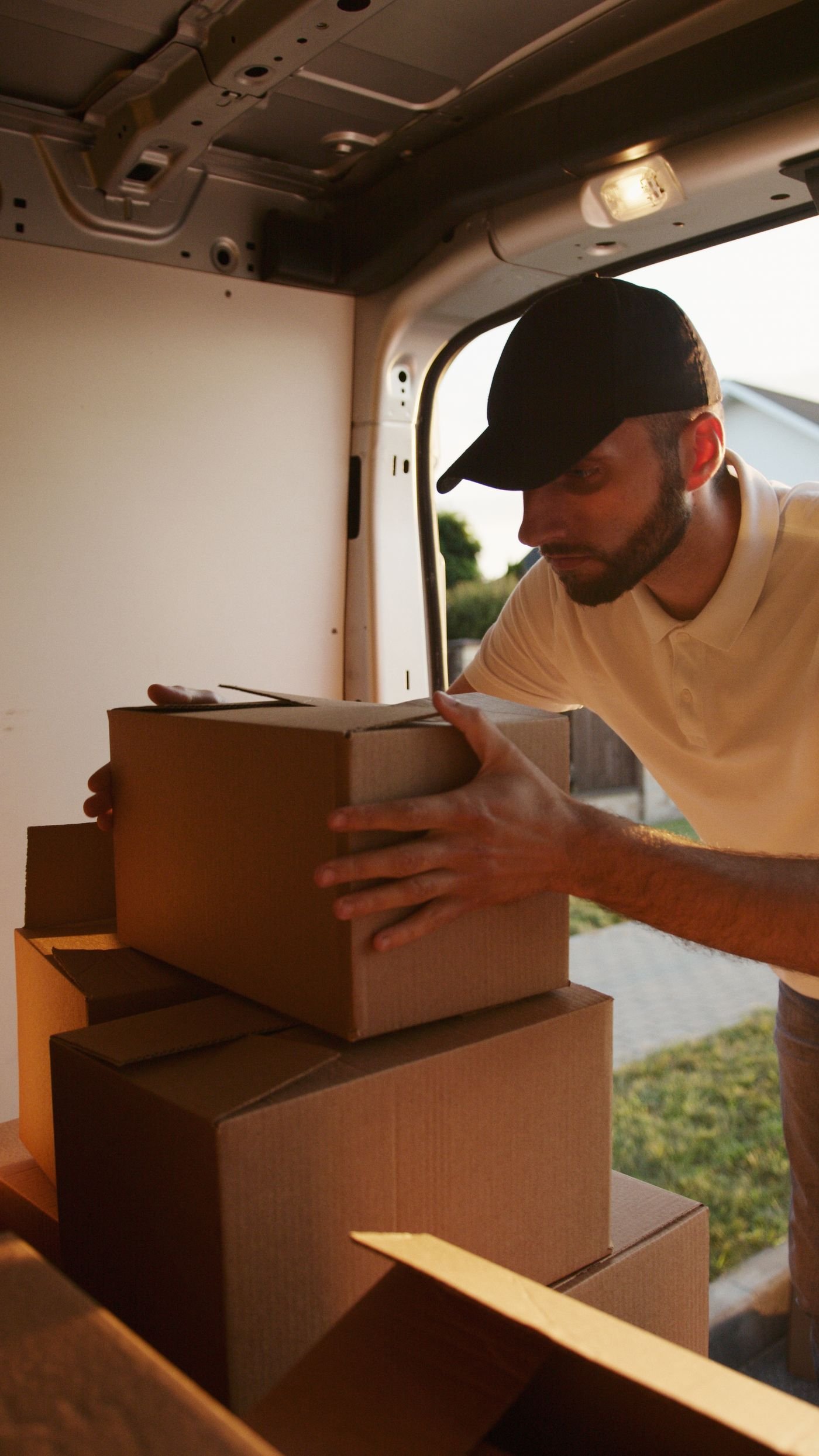 Courier carrying packages during pickup